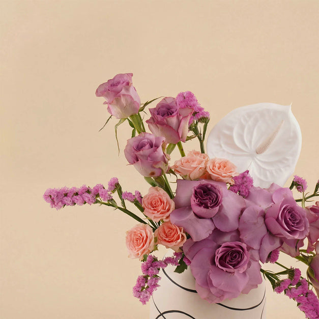 Purple Roses Vase with White Anthurium