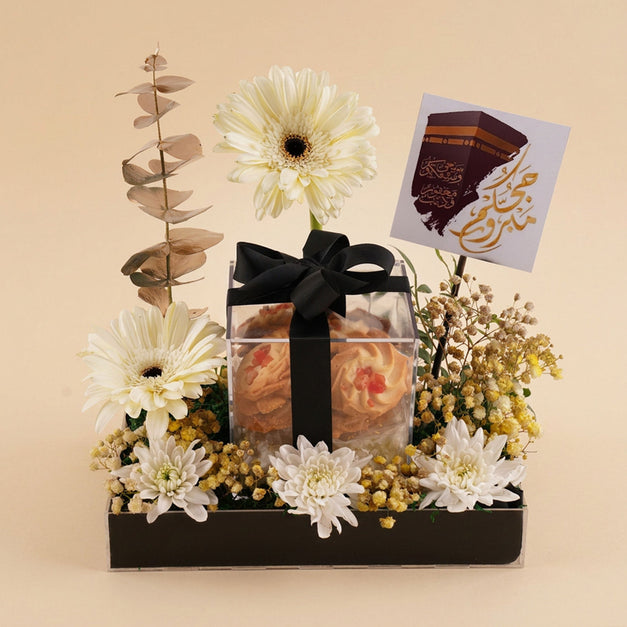 Hajj Welcome Gift with Cookies and White Flowers