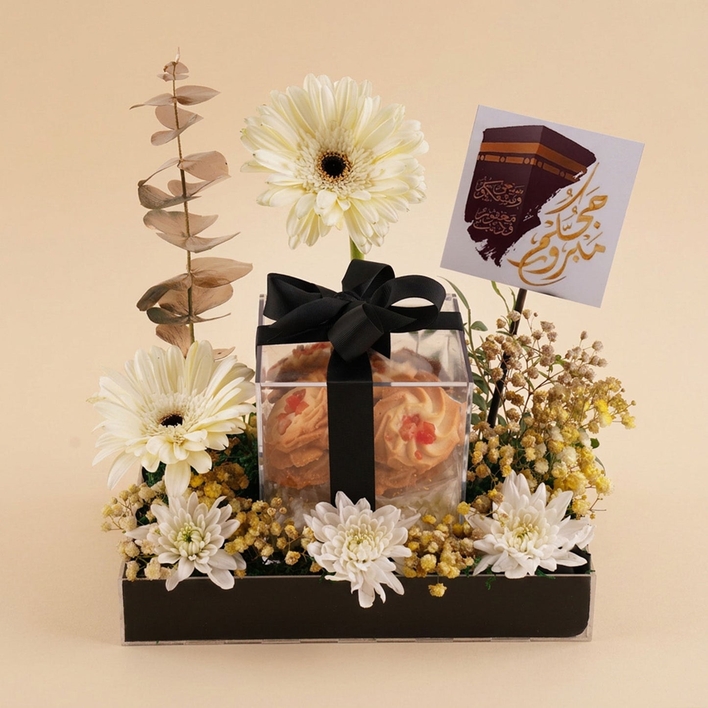Hajj Welcome Gift with Cookies and White Flowers