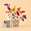 Father's Day Flower Arrangement with Skinn Perfume by Titan